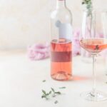 Glass and bottle of rose wine